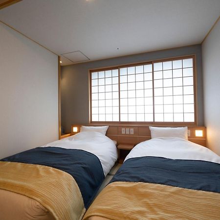Kyoto Umekoji Kadensho Quioto Exterior foto A room at the hotel